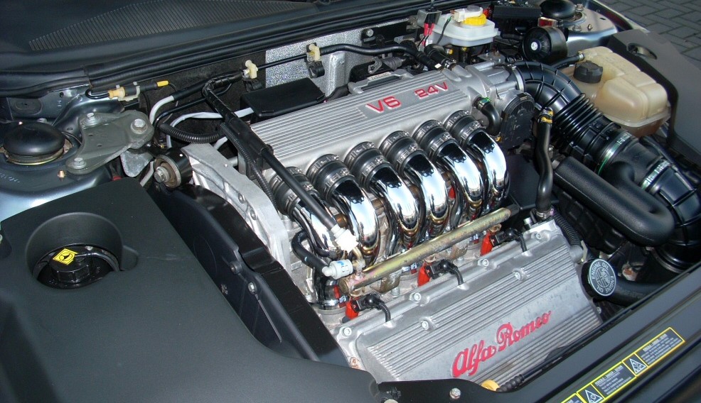Alfa Romeo V6 busso engine bay, a well-maintained engine with polished air inlet pipes, very clean