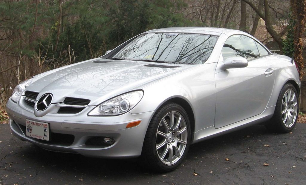 Used, silver Mercedes-Benz SLK-Class car, R171 model, hardtop convertible with the roof closed