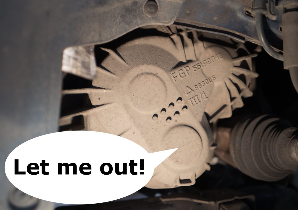 M32 gearbox mounted in a Vauxhall car, text bubble pointing at the 6th gear bearing with the text saying "let me out"